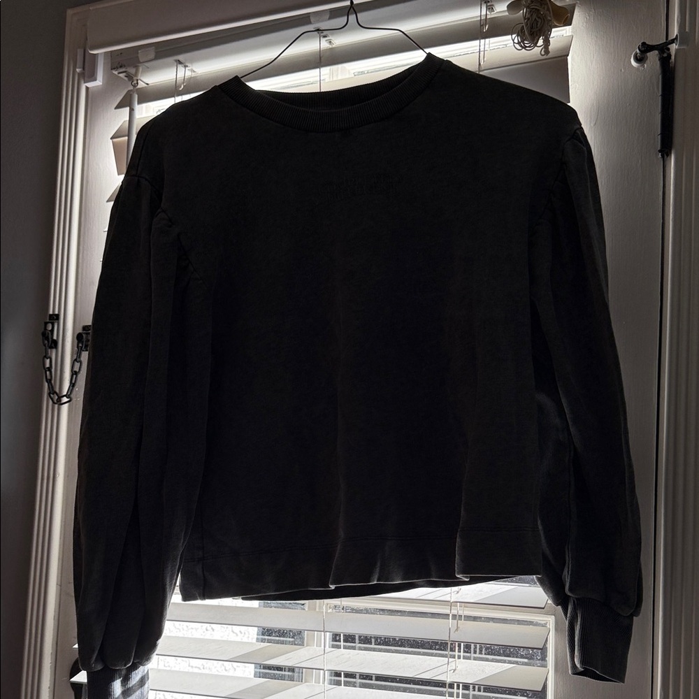 Woman’s grey Sweater